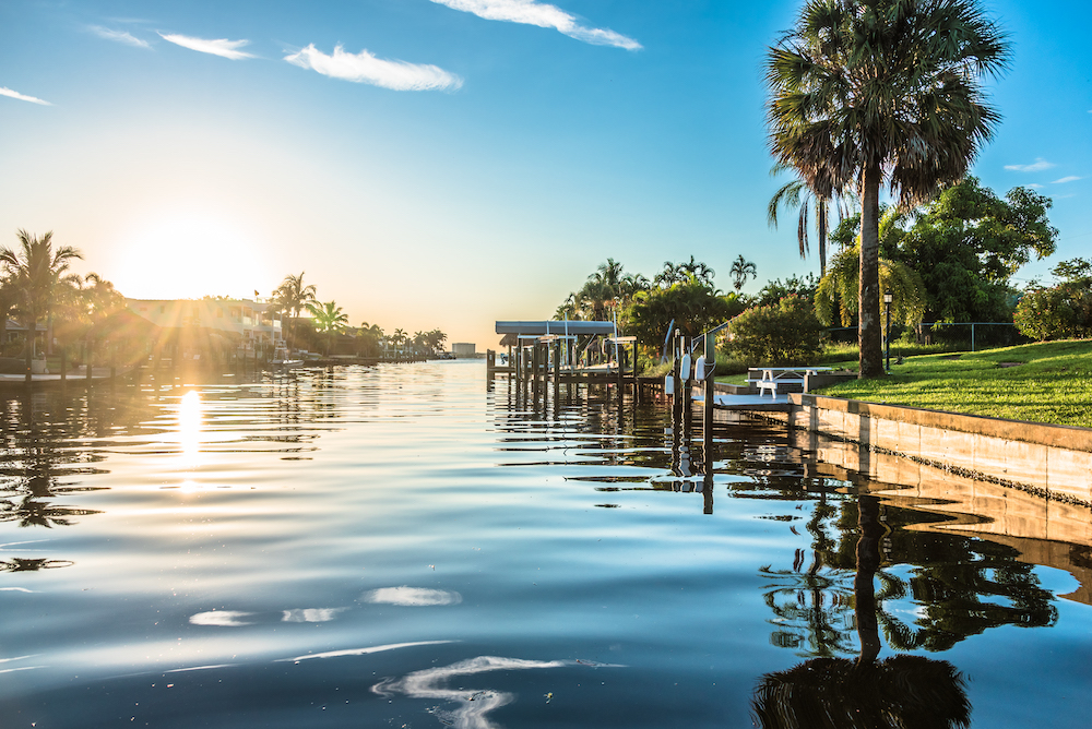 Sunrise over canal in Fort Myers